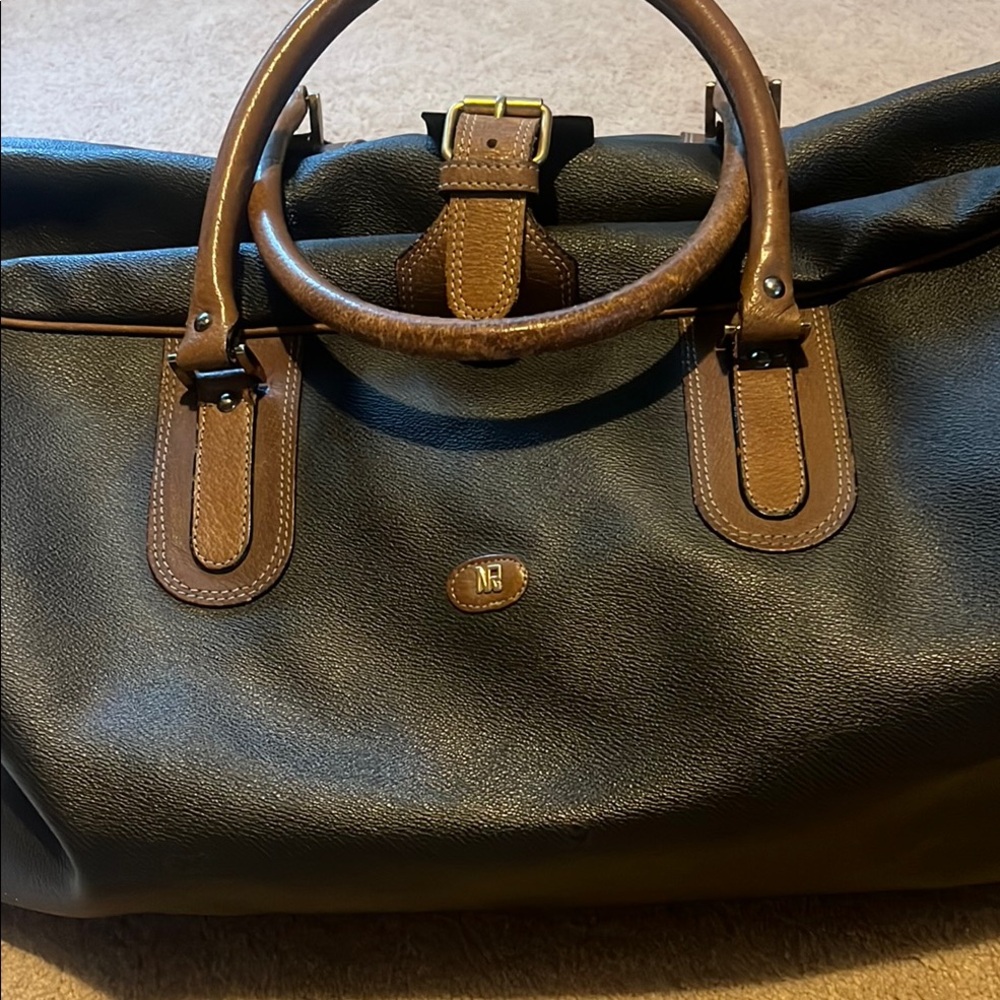 Nina Ricci Brown Travel Bag with Structured Design